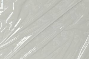 plast transparent cellofan väska på vit bakgrund. vit plast filma slå in textur bakgrund. vit plast väska textur foto