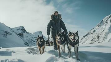 ai genererad man med huskies i snöig bergen ai genererad foto