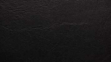 svart läder textur bakgrund, glansig svart, sömlös mönster, och hög upplösning. foto