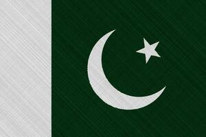 flagga av islamic republik av pakistan på en texturerad bakgrund. begrepp collage. foto