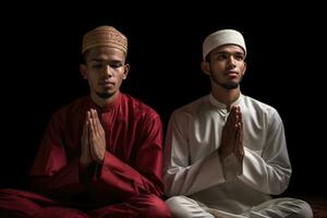 ai genererad två muslim män bön- i en mörkare rum foto