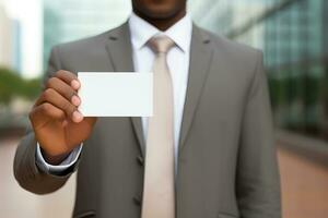 ai genererad en man i företag kostym innehav en vit tom företag kortnamn kort. ai genererad. foto