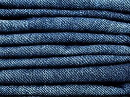 stack av blå jeans bakgrund foto