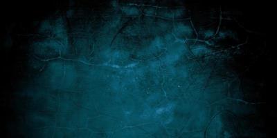 skrämmande mörkblå sprucken vägg för bakgrund foto