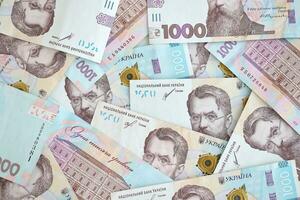 ukrainska pengar, textur från ukrainska sedlar i de valör av ett tusen hryvnian foto