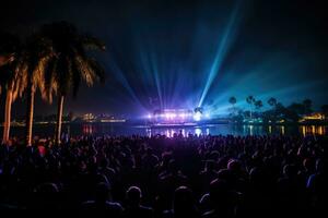 ai genererad glädjande folkmassan på konsert i främre av ljus lampor på strand . ai generativ foto