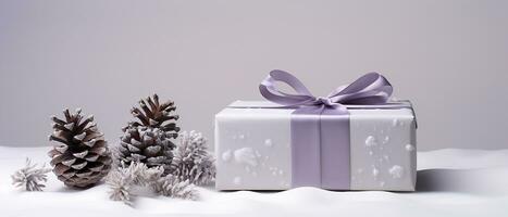 ai genererad vinter- gåva med lila band med kottar på en vit bakgrund och snöflingor foto