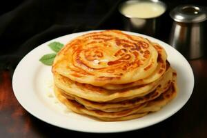 ai genererad favorit frukost paratha, kanai, eller roti maryam på en tallrik foto