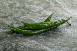 varm och kryddad grön chili peppar foto