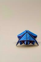 ai genererad origami krabba på ljus bakgrund foto