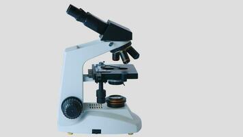 isolerat mikroskop på vit bakgrund foto