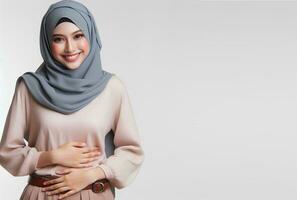 ai genererad asiatisk muslim kvinna i hijab med händer Framställ isolerat vit bakgrund foto