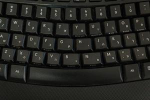 tangentbord med bokstäver på hebreiska och engelska foto