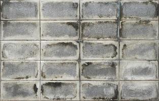 gammal betong tegel vägg mönster textur bakgrund.