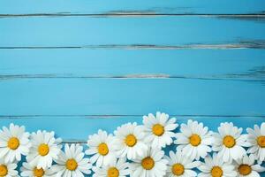 ai genererad gräns av vit daisy blommor på en blå trä bakgrund foto