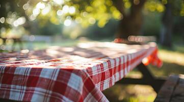 ai genererad en picknick tabell med en röd och vit bordsduk foto