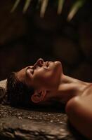 ai genererad en kvinna liggande ner på en massage tabell om på en sten platta foto