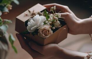 ai genererad ett person presenterar en gåva låda till annan person med blommor inuti foto