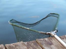 fiskegrejer för fiskespön, flottör, nät foto