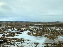 en se av de island landsbygden i de vinter- täckt med snö nära de Gulfos vattenfall foto