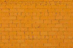 orange plåster grov tegel utanför vägg textur foto