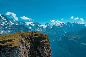 schweiz, panorama- se på Mürren och grön alps runt om foto