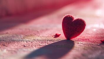 ai genererad röd hjärta på en rosa bakgrund. hjärtans dag. foto