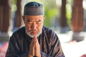 ai genererad religiös asiatisk muslim man bön- foto