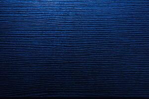 mörk abstrakt bakgrund av trä, Färg av Spöke blå. foto