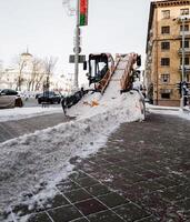 trottoar rengöring i vinter- foto