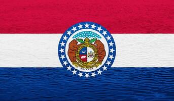 flagga av missouri stat USA på en texturerad bakgrund. begrepp collage. foto