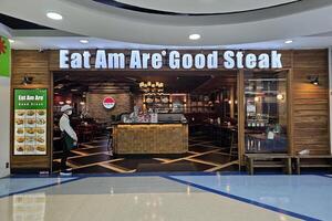 Bangkok, thailand september 22, 2023 äta am är tecken. den är en känd Steak House i Bangkok, thailand. foto