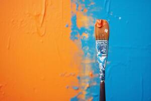 ai genererad måla borsta doppade i orange måla på färgrik orange och blå bakgrund, kopia Plats. ai genererad. foto