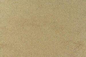 sand textur. strand sand för bakgrund. topp se foto