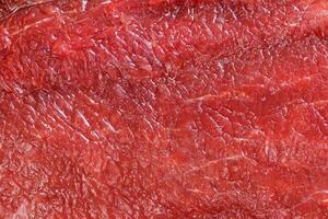 rå röd nötkött kött makro textur eller bakgrund foto