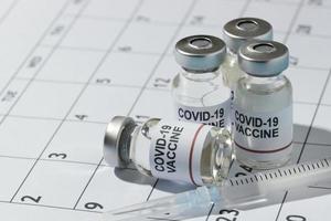 minimal vaccin flaskor sammansättning kalender foto