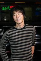 aron yoo anländer på de premiär av Örn öga på mannens kinesisk teater i los angeles ,ca på september 16, 2008 foto