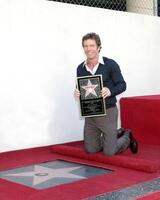 dennis quaid dennis quaid promenad av berömmelse ceremoni hollywood promenad av berömmelse los angeles, ca november 16, 2005 foto