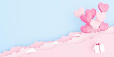 alla hjärtans dag bakgrund, 3d rosa hjärtformade ballongbukett med presentförpackning svävande på himlen med pappersmoln foto