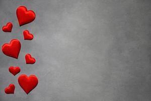 röd hjärtan på en grå bakgrund. bakgrund för en vykort foto