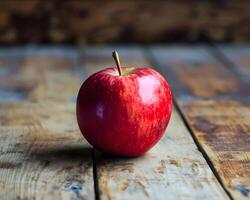 ai genererad en röd äpple Sammanträde på topp av en trä- tabell foto
