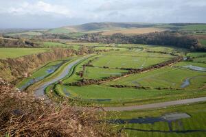 utsikt över cuckmere river valley från hög och över utsiktspunkt i sussex foto