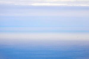 bakgrund, waters - de morgon- hav går samman med de himmel foto