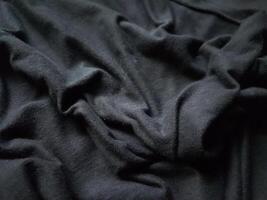 svart tyg bakgrund mönster textur foto