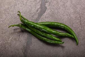 varm och kryddad grön chili peppar foto