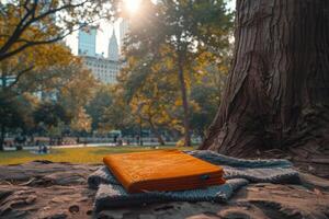 ai genererad en filt och en bok under en träd i en solig vår parkera professionell fotografi foto