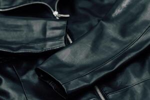 svart textur eco mjuk läder, modern jacka foto
