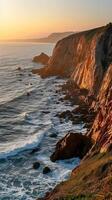ai genererad kust klippor på solnedgång, dramatisk klippor längs de kustlinje med vågor kraschar Nedan, bakgrund bild, generativ ai foto