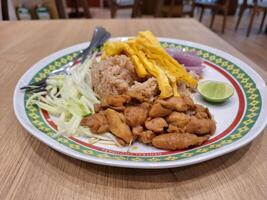 bild av mat, restaurang, thai mat kallad khao kluk räka klistra foto