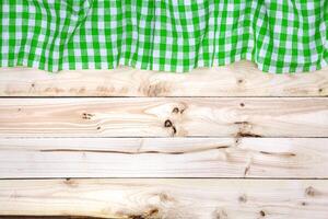 grön bordsduk på trä- tabell, topp se foto